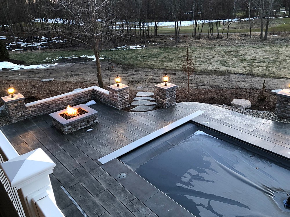 patio area with a pool